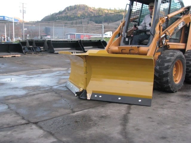 HLA V-Blade angled position mounted on skid steer