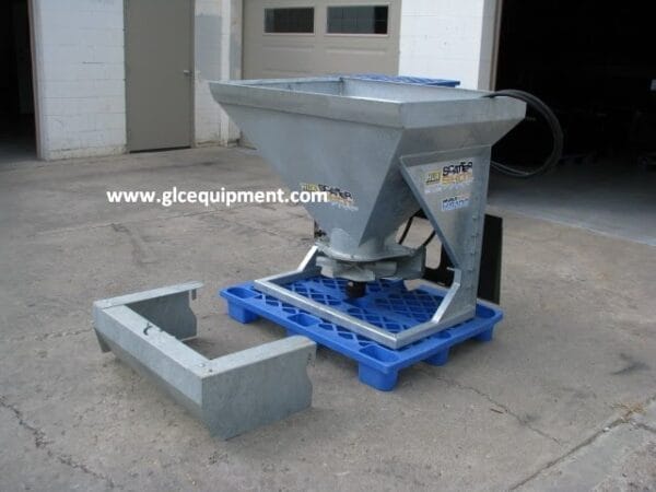 Skid steer mounted sand spreader