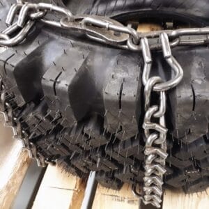 winter tire chain V-bar style on a skid steer tire