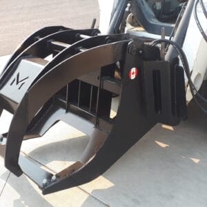 Martatch Log Grapple mounted on a Bobcat skid steer