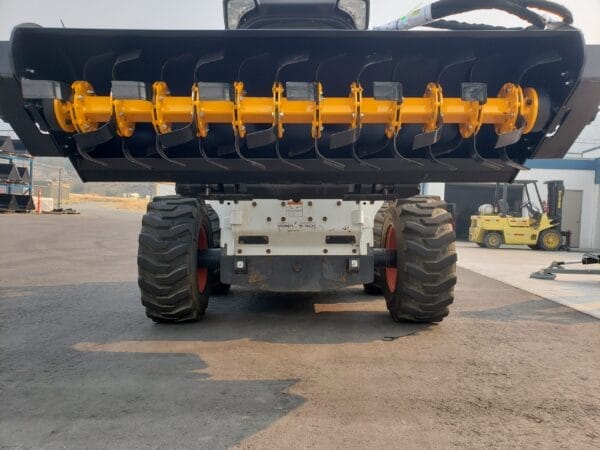 Erskine rototiller mounted on skid steer